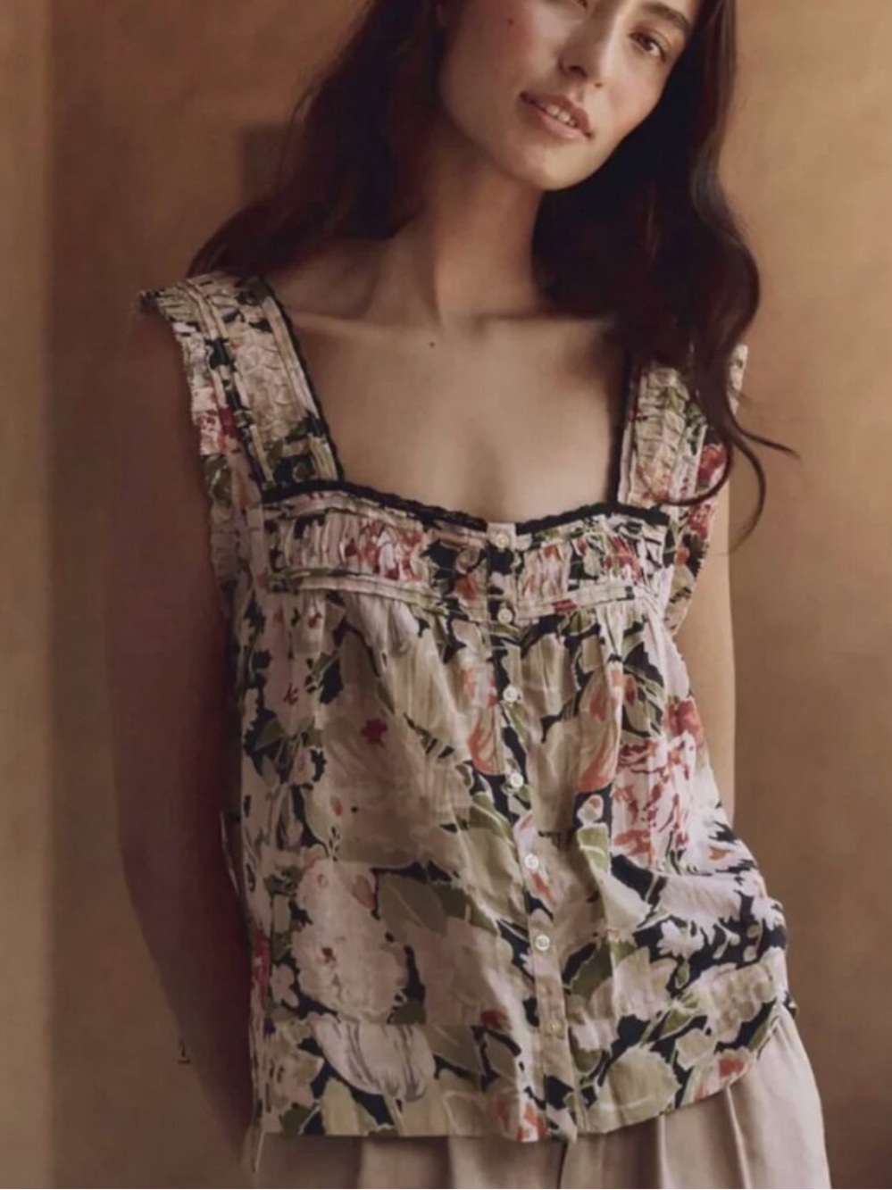 The Great Floral Button-Front Ruffle Tank Top in Cream and Black